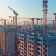 Construction Site With Workers On The Roof Zoom Out - VideoHive Item for Sale