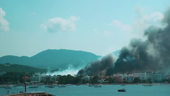 Plane And Helicopter Putting Out Balearic City Fire 4k