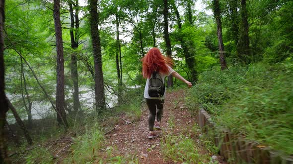 Woman with Red Hair, Running