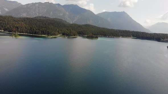 beautiful drone video of an lake and mountains, eibsee in bavaria