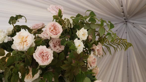 Composition Bouquet of White Rose Flowers on the Roof Tent