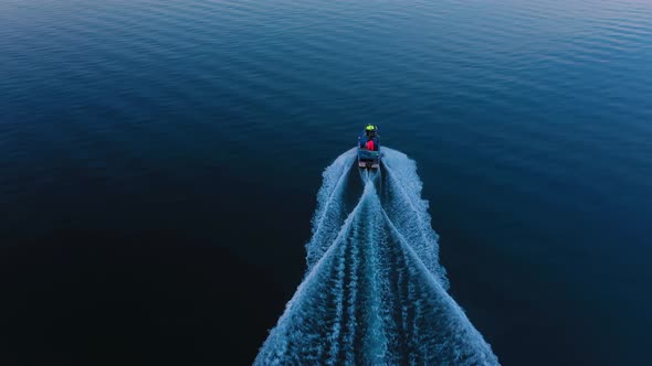 Aerial view of a fishing boat floating in sea