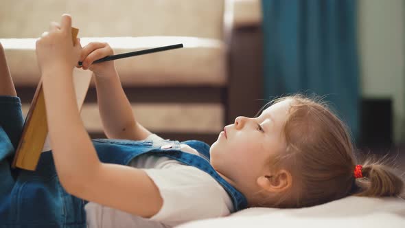 Little Girl with Blond Long Hair