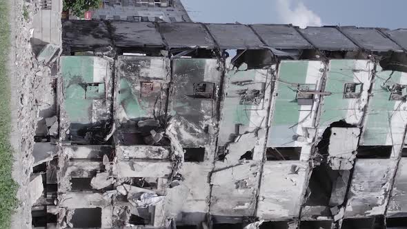 Vertical Video of the Consequences of the War in Ukraine  a Destroyed Building