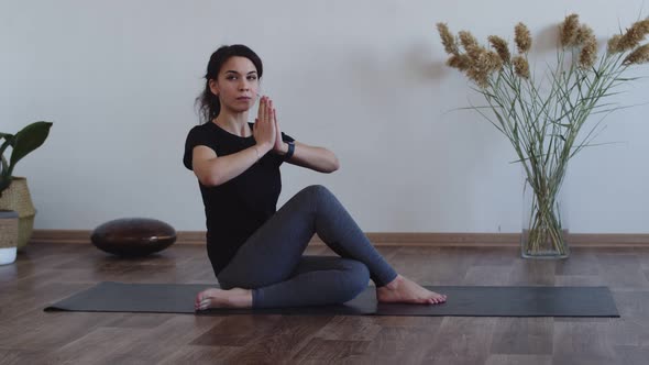 Woman in Sportswear is Engaged Aerobic Sports Yoga at Fitness Club Front View