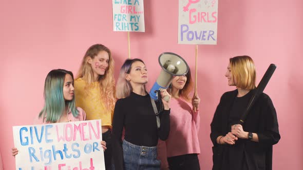 Portrait of Confident Women Fighting for Women Rights Holding Posters