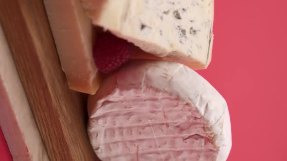 Vertical video: Parmesan, blue cheese and camembert