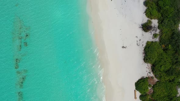 Aerial top down tourism of paradise lagoon beach trip by aqua blue lagoon with white sandy backgroun