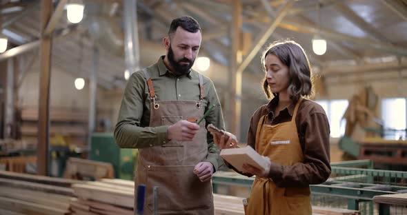 Two Carpentry Workers at the Manufacturing