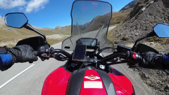 POV Biker Rides on Motorbike By Scenic Mountain Pass in Swiss Alps Moto Trip