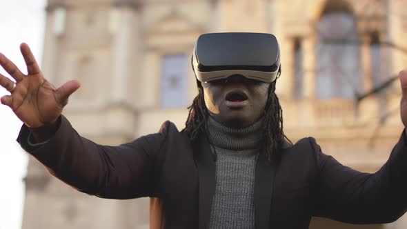 Excited African American Black Man Experiencing Virtual Reality