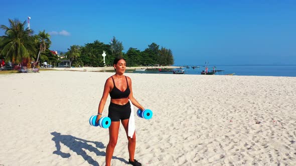 Beautiful ladies happy and smiling on paradise resort beach adventure by blue water and white sand b