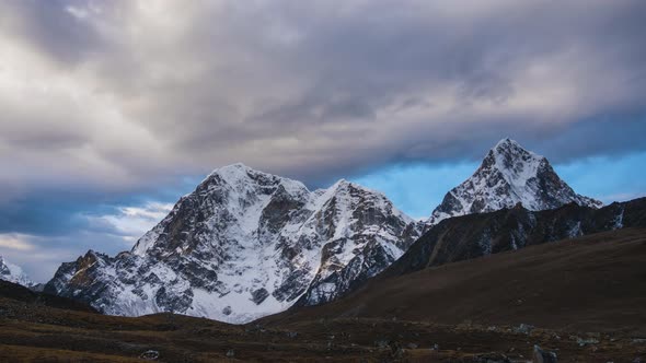 Taboche and Cholatse Mountains and Cloudy Sky. Himalaya, Nepal