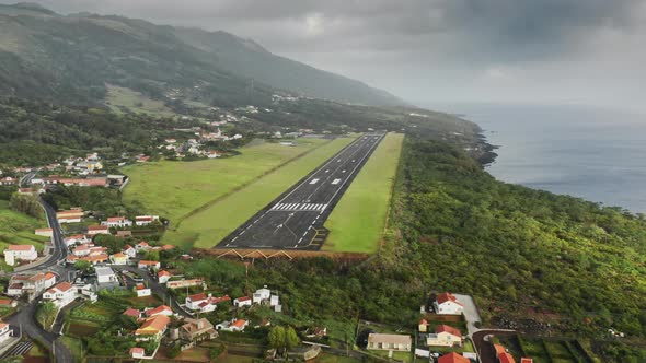Panoramic View with a Small Airport and Charming Cottages