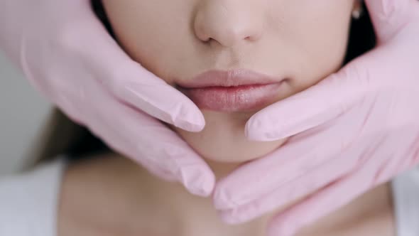 Closeup of Woman Having Facial Massage in Beauty Salon