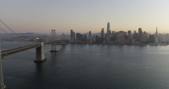 Panning Shot of the Bay Bridge and San Francisco Skyline at Dusk