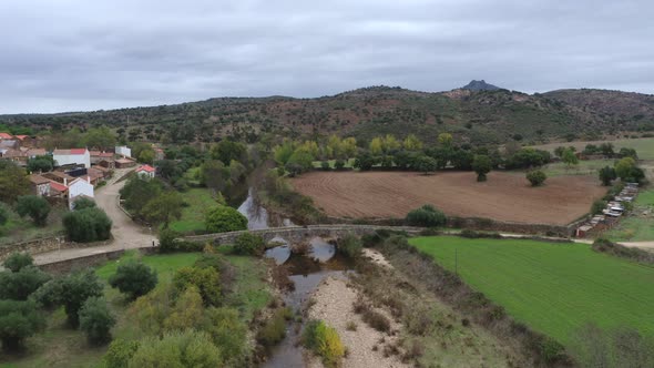 Drone aerial view of Idanha a velha historic village and landscape with Monsanto on the background,