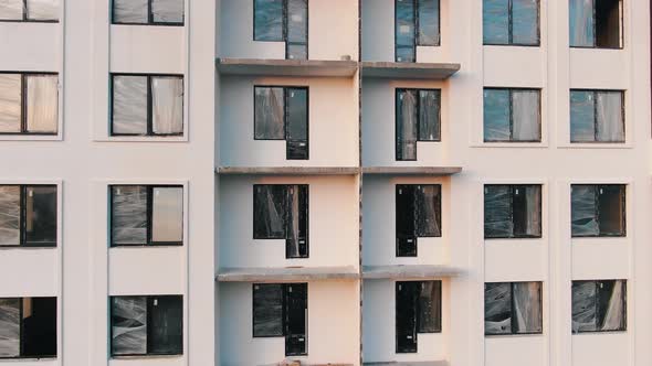 Motion Upward Unfinished Building with Unglazed Windows