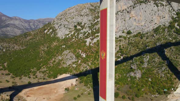 The Big Red Coat of Arms of Montenegro is Seen on One of the Bridge's Pillar