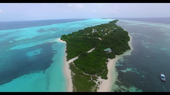 Aerial drone view scenery of marine coast beach lifestyle by clear sea with white sand background of