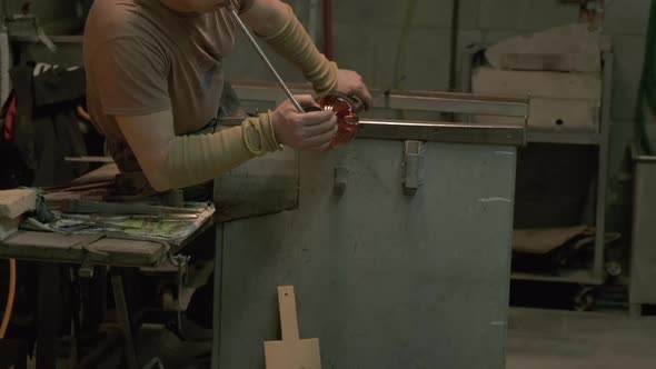 Artist Blowing Glass, Working in Furnace in Murano, Italy