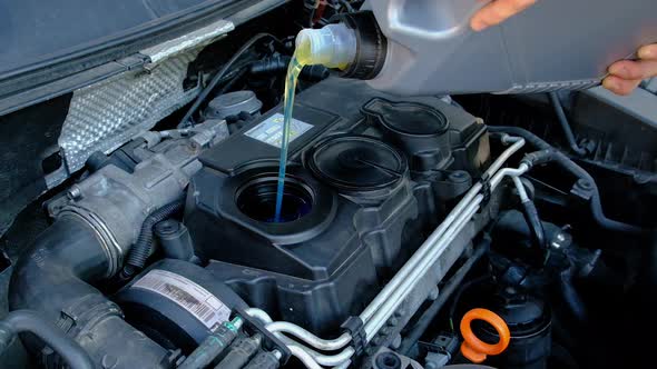 Fill Engine Oil with Engine Oil