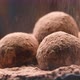 Cocoa powder falling on luxury homemade truffle candies - VideoHive Item for Sale