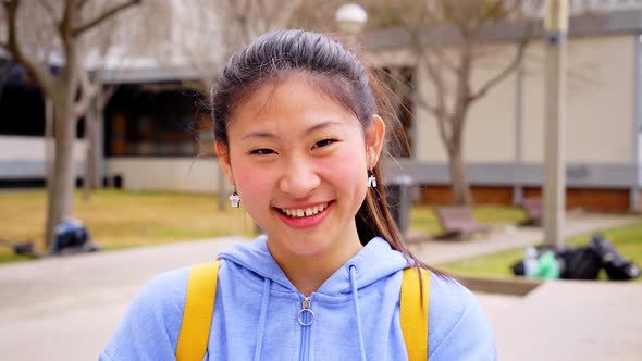 Chinese Teenager Smiling Happy at University Campus