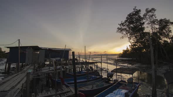 Timelapse dusk hour at a fisherman village at Penang.