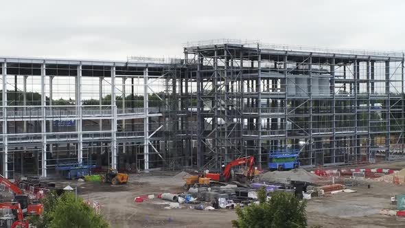 Aerial view restricted modern concrete office building construction site