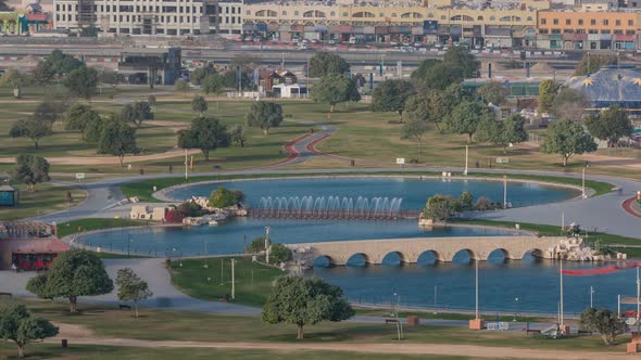 Bridge with Fountain and Lake in the Aspire Park Timelapse in Doha Qatar