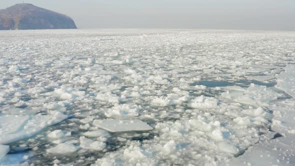 Slow Drone Flight Over Floating Ice in a Strait Among Ice Fields