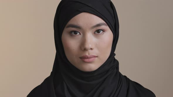 Portrait Serious Asian Korean Malaysian Girl in Black Hijab Traditional Headscarf Lonely Muslim