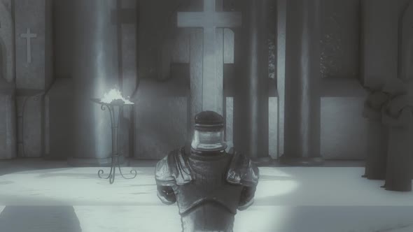 Medieval Paladin Knight With Full Armor  On His Knees Praying Inside A Monastery