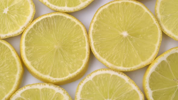 Lemon Slices Closeup, Macro Food Summer Background, Fruits Top View. Rotate