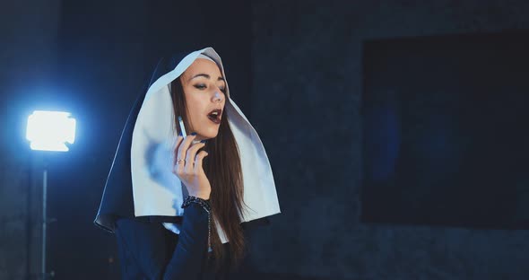 Beautiful Catholic Nun Smokes