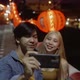 Young Asian couple travel make a video live streaming on social network by smartphone. - VideoHive Item for Sale