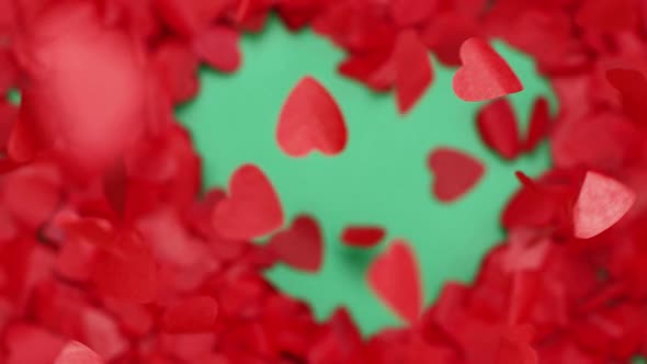 Red Paper Confetti Hearts Flying on Chroma Key Green Screen Background