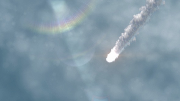 Asteroid Meteor Flaming Fireball Burns as it speeds across the sky