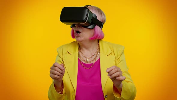 Elderly Woman Using Virtual Reality VR App Headset Helmet to Play Simulation 3D Video Game Drawing