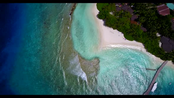 Aerial abstract of beautiful shore beach adventure by blue sea with white sand background of a dayou