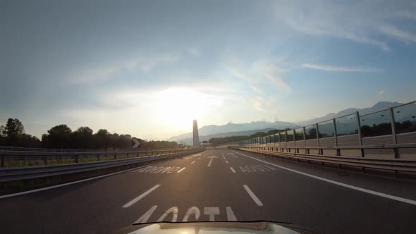 Summer Road Trip on Europe Firstperson View of a Moving Car on a Highway and Bridges Natural