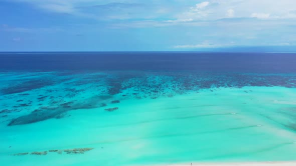 Aerial sky of beautiful coastline beach holiday by aqua blue ocean and clean sand background of a da