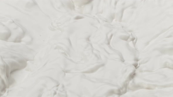 Super Slow Motion Shot of Swirling Fresh Cream at 1000 Fps