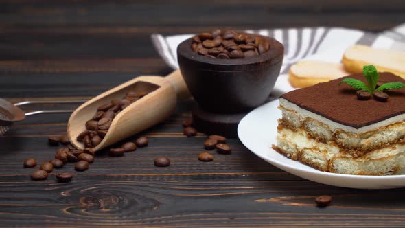 Portion of Traditional Italian Tiramisu Dessert Coffee Beans and Savoiardi Cookies