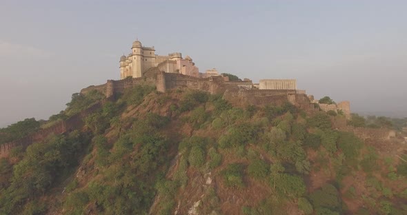 A slow revealing crane-like shot of the 15th Century Hill Fort of Kumbhalgarh in Rajasthan