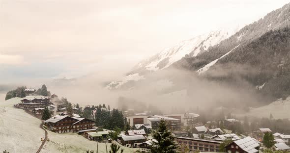 Time Lapse of clouds moving in a valley, Kleinwalstertal Austria with snow