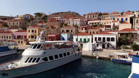 Rhodes, Greece: Pan shot from Emboria harbour of traditional beautiful multicolored houses 