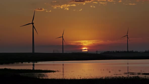 Windmills Turbines at Sunset