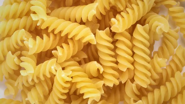 Pile of fusilli pasta background